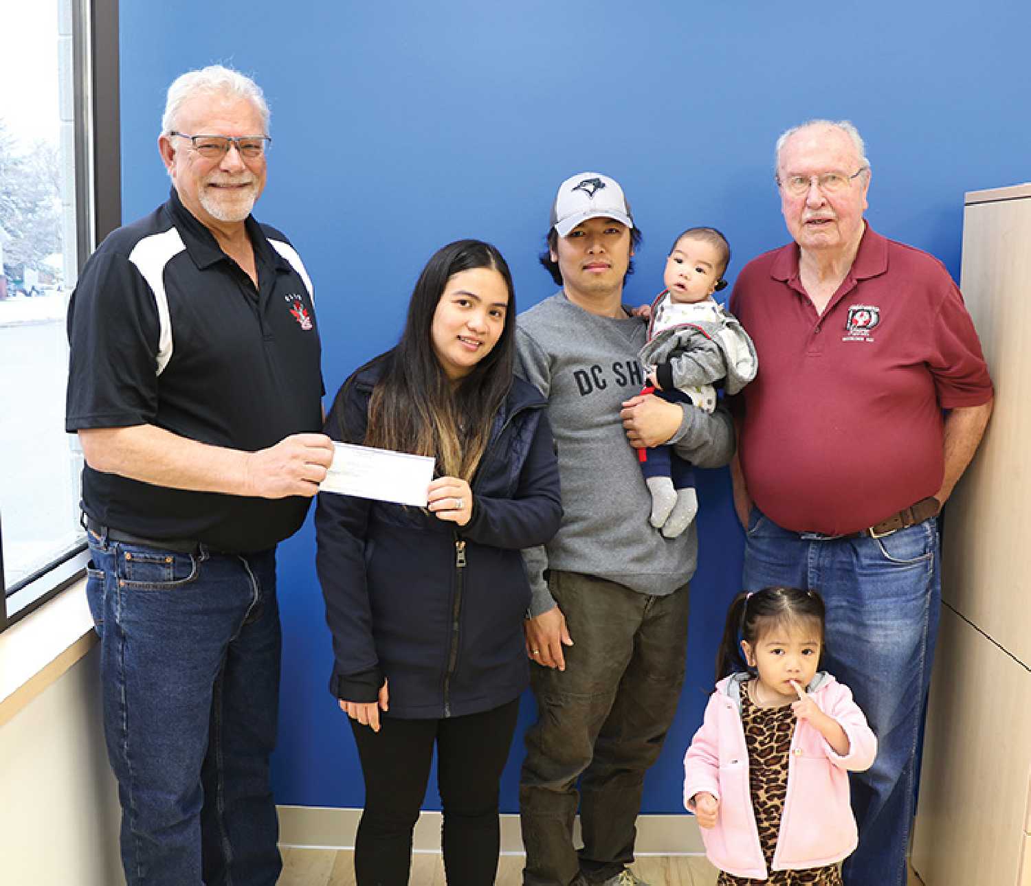 Moosomin Elks donate $4,000 to the Visperas family to help cover their travel expenses going to Regina, as they go see a doctor in help treat their sons medical condition of microtia. Left: Ron Potter of  Moosomin Elks, Danica and Armisto Jr. Visperas, their son  Armisto III, Primrose and (right) Mel Durant of Moosomin Elks.